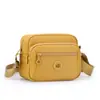 2026 Nueva Bolsa Lisa para Mujer Moda Lisa Tendencia Hombro Único Cruzada Nylon Bolsa para Mujer Casual Bolsa Cuadrada Pequeña