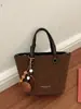 Bolso tipo cubo de estilo retro para mujer, nueva colección otoño 2026, bolso de hombro simple y casual con diseño coreano