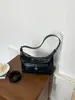Bolsa de axila de nicho de moda transfronteiriça feminina novo estilo bolsa de mão de alta qualidade elegante bolsa versátil de ombro único transversal