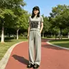 Tamaño completo: Conjunto deportivo casual estilo coreano para mujer, nuevo conjunto de dos piezas de alta gama para el verano de 2026, con camiseta de manga corta y pantalones de pierna ancha