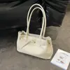 Bolsa Tote de Cor Sólida com Textura de Tricô Solto Chegada Nova Verão 2026 Nicho Alta Aparência Grande Capacidade Bolsa de Ombro Bolsa de Braço