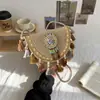2026 Bolso Tejido de Paja de Moda Nuevo Estilo Playa Artístico Bolso Tejido para Mujer Estilo Étnico Nicho Versátil Bolso Cruzado con Borlas