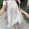 Camisa blanca de cuello de muñeca de manga corta para mujer, estilo japonés, dulce, holgada, adelgazante, con mangas acampanadas, top de color liso, nuevo modelo primavera/verano