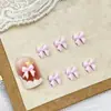 Acessórios de unhas mini laço atacado tamanho pequeno tridimensional versátil laço de fita resina DIY acessórios para unhas