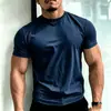 Camiseta de entrenamiento para hombre, manga corta, color blanco, 100% algodón, mejora muscular, transpirable, cuello redondo, color liso, versátil, corte ajustado