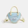 2026 bolso de diseño nicho con estampado de cuadros en forma de corazón, lindo adorno de dibujos animados, bolso de mano, correa de hombro ajustable, bolso pequeño cruzado