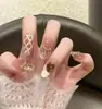 Uñas Portátiles de Alta Gama para Año Nuevo: Rojo Retro Cisne Puntos, Ojo de Gato Francés, Moño, Brillo Deslumbrante, Manicura Hecha a Mano que Realza el Cutis