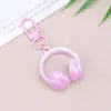 Llavero de Auriculares con Cabeza Tridimensional de Caramelo Sinfonía Acrílica Moda Más Fácil de Combinar Colgante Creativo para Bolsos Colgante para Pareja Mejor Amigo
