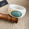 Pulsera ovalada de acrílico con degradado, europea y americana, transfronteriza, sensación de lujo ligero de alta gama, accesorio femenino simple, elegante y versátil