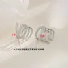 Pendientes de hueso de la oreja con temperamento INS de gato antiguo con diamantes de líneas multicapa de sentido avanzado, red de cruz roja con clip para la oreja sin agujero en la oreja, mujeres