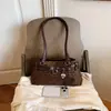Bolso de axila estilo retro, nueva colección verano 2026, bolsa de mano casual para el día a día, con un look relajado y con estilo