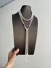 Collar redondo de perlas con cuentas estilo francés, sensación de lujo ligero y alta gama, cadena de suéter de doble capa, accesorio de nicho de diseño único para mujer