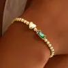 Pulseira de Coração com 12 Pedras de Nascimento Europeia e Americana Transfronteiriça Nova Moda Estilo Levemente Luxuoso Pulseira de Contas Redondas Douradas para Mulheres 2026