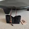 Bolsa tote simples de lona para mulheres, bolsa de ombro grande para o dia a dia, nova coleção outono 2026, cor sólida, estilo descontraído, bolsa de mão