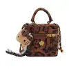 Bolsa de Mão Mini Batom Feminino de Luxo Leve Estampa de Leopardo Moda Nicho Pequena Fragrância Bolsa Acessório Transversal de Ombro Feminino