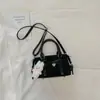 Bolso Boston pequeño de mujer transfronterizo 2026 nueva moda bolso de hombro exquisito bolso cruzado versátil simple para el día a día