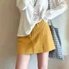 Falda-pantalón amarilla de trabajo para mujer, estilo fino de verano, adelgazante para figuras petite, shorts de pierna ancha línea A anti-exposición estilo Yamamoto