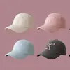 Gorra bordada con lazo nueva de Corea del Sur sombrero para el sol de primavera y verano cara dulce linda gorra de béisbol pequeña