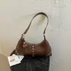 Bolsa Tote Feminina Popular Estilo Coreano para o Dia a Dia com Rebites Nova Textura Leve Luxo 2026 Vintage Chique de Ombro