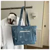 Bolsa de Ombro Tote Jeans Estampada Transfronteiriça 2026 com Laço Bordado de Grande Capacidade Nova Casual para o Dia a Dia Moda