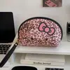 Bolsa de Maquillaje con Estampado de Leopardo para Mujer 2025 Nuevo Modelo Portátil de Gran Capacidad Bolsa de Almacenamiento de Maquillaje Bolso de Mano para Artículos de Tocador