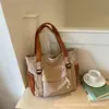 Bolso de lona de color liso para mujer 2026, bolso de hombro de gran capacidad, bolso tote elegante para estudiantes, bolso de mano y bolso cruzado