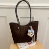 Bolso elegante y minimalista de gran capacidad para mujer, nueva colección 2026, bolso de hombro casual con un ambiente relajado, bolso tote de alta calidad