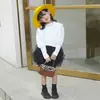 Camiseta para niñas de Primavera y Otoño, elegante y moderna, estilo coreano, manga abullonada, color liso, base elástica para niños