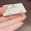 Moda Versátil Exquisita Francesa Hebillas Pequeñas para Orejas Estrella de Circonita Temperamento Lujo Ligero Versátil Pequeñas Sensación de Alta Gama Aros de Oreja Súper Brillantes