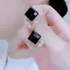 Pendientes de Cristal con Forma de Rombo Doble 2026 Nuevos de Moda Celebridad de Internet Versátiles Pendientes de Perla con un Toque de Lujo de Alta Gama