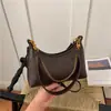 Bolsa retro para o dia a dia Shuai Mi Home para mulheres, nova coleção de outono 2026, bolsa de ombro de nicho, bolsa de axila e bolsa transversal Maillard