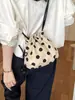 Bolso Cubo con Cordón de Lunares Transfronterizo 2026 Nuevo para Mujer, Bolso de Hombro Cruzado Versátil de Gama Alta, Moda de Nicho para Viajar