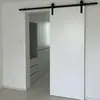 Puerta de granero Jianai, puerta sin pintar, puerta fantasma, puerta corredera, puerta de riel colgante, puerta corredera de madera WPC, exportación de fábrica al por mayor