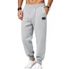Pantalones jogger de hombre de color liso con textura estilo americano para otoño, pantalones deportivos largos casuales para hombre con cintura elástica y cordón