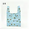 Bolsa Portátil Estilo Europeo y Americano Bolsa de Compras Ecológica para Supermercado Poliéster 210D Bolsa de Compras Plegable Cuadrada Estilo Chaleco Bolsa de Almacenamiento de Nylon