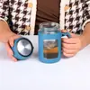 Vaso de agua de plástico con asa para el hogar, taza de té de negocios con asa, taza de vidrio de regalo, taza moderna minimalista, separación de té y agua