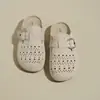 Chinelos Birkenstock que aumentam a altura para mulheres 2026 verão novos chinelos fechados vazados sandálias de meia-sola com sola grossa