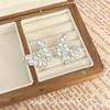 Pendientes exquisitos de mariposa de diamantes completos súper hada 2024 nuevos pendientes de temperamento nicho de lujo ligero para mujer pendientes de alta gama