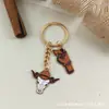 Chaveiro de Cowboy do Velho Oeste Americano Pingente de Liga de Touro Gota de Óleo Chaveiro de Carro Bolsa para Casal Pronta Entrega Atacado