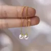 Aretes Elegantes de Borla de Cadena Cao Shi para Dama Accesorios Diarios de Moda Nicho Perla de Imitación Exquisita Estilo Popular