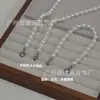 Botón de presión de acero inoxidable Collar Pulsera Cadena para suéter de perlas que no se decoloran Cadena de nácar redonda blanca australiana de alto brillo