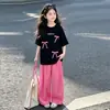 Conjunto Deportivo Casual para Niñas Pantalones Anchos 2026 Nuevo Elegante Niña Lazo Manga Corta Verano Conjunto de Dos Piezas
