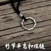 2026 Nuevo Vintage Nudo de Bambú Hebilla de Paz Collar de Suéter Accesorio de Moda Unisex Colgante Collar para Pareja
