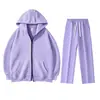 Conjunto de sudadera unisex negra con capucha y cierre, que incluye una sudadera holgada abierta por delante y pantalones de chándal de pierna recta con cordones, un conjunto de dos piezas