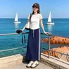 Conjunto de Verão Super na Moda 2026, um Conjunto Muito Atraente de Camisetas de Manga Curta e Saias Femininas, Pequeno Conjunto Único e Bonito