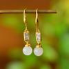 Pendientes de jade blanco con incrustaciones de cobre, ganchos para la oreja con cuentas redondas de jade hetiano, pendientes de oro de jade de moda, suministro en vivo al por mayor