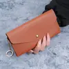 2026 Novo Modelo Carteira Longa Feminina Versátil de Cor Sólida com Múltiplos Porta-Cartões, Bolsa Clutch com Fecho de Botão, Bolsa de Celular Fashion, Carteira de Couro Macio