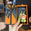 Llavero de oso bombero policía de tráfico de dibujos animados con pegamento goteando, regalos promocionales, accesorios de moda para parejas, cadena colgante linda para mochila escolar