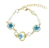 Pulsera de Resina con Flores Secas de Flor de Cerezo Chapada en Cobre Color Oro Real Joyería Conservadora de Color Mariposa Perla Pulsera Exquisita Planta