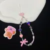 Ins chica delicada cordón para teléfono con cuentas corazón lazo cadena corta para teléfono adorno colgante para cámara ccd colgante para bolso